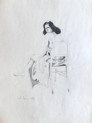 Back nude on chair