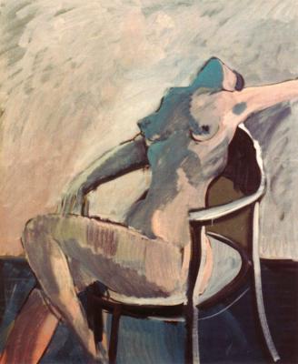 Sitting nude on armchair