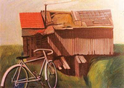 Bicycle in front of a barn