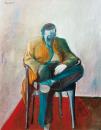 The artist sitting on armchair